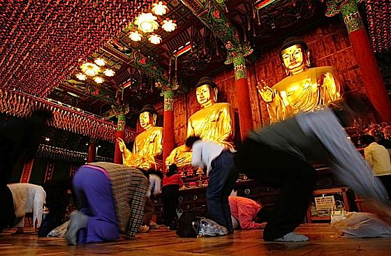 Respectful full-prostration bows are important to devout Korean Buddhists, one of the six essential practices.