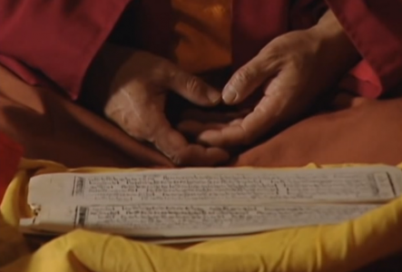 Formal sadhanas are transmitted in text form through an unbroken lineage from guru to guru back to the Buddha. Here, a meditator in lotus position meditates with a written text (Sadhana) as a guide. A Sadhana combines sounds (prayers and mantras), actions (mudras), intense visualizations (guided), even a sense of place (mandalas) and the six senses (smells, tastes, and so on from the visualized offerings.)