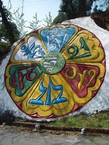 In Tibet and some areas of India or Nepal you might come across Mani walls or Mani rocks like this one. These numerous tributes to Chenrezig remind us to keep compassion in our heart as we go about our daily tasks. The Mani wheel shown here has the "Hrih" seed syllable in the centre and the full Om Mani Padme Hum mantra in Tibetan letters.