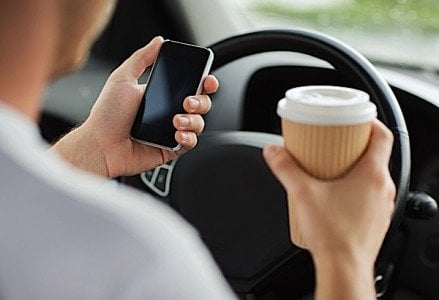 Buddha Weekly Distracted Driving coffee texting Buddhism