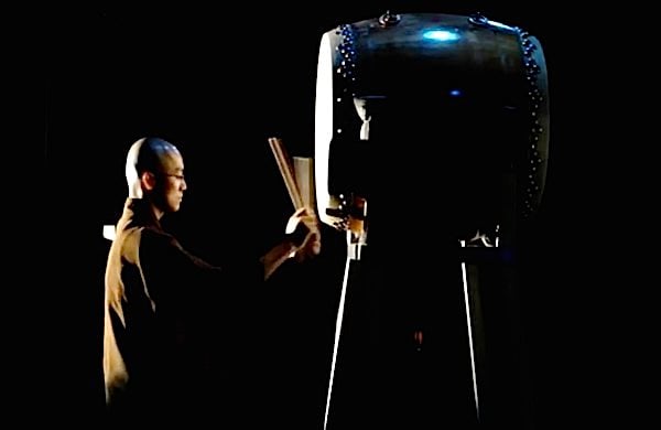 Monk on the big drum. This discipline is training for the mind.