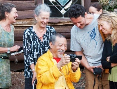 Outside of formal teachings, Rinpoche enjoys a laugh with students.