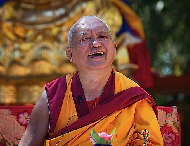 Monks and Buddhist teachers tend to laugh or smile frequently. Lama Zopa Rinpoche laughing.