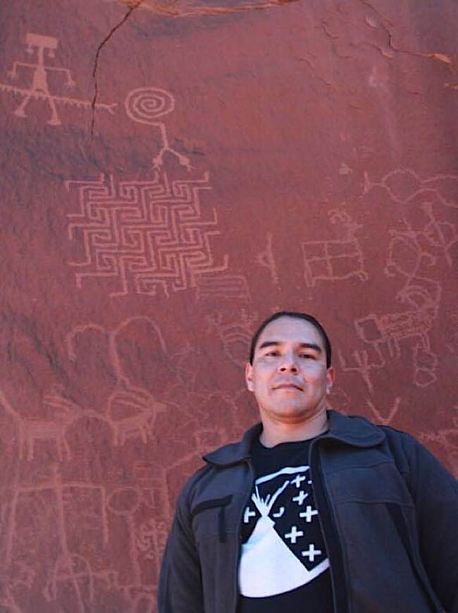 Buddha-Weekly-Sean Wei Mah in front of Pictographs-Buddhism