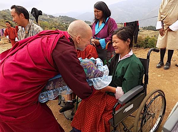 Buddha Weekly Emma Slade with children Opening Your Heart to Bhutan Charity Buddhism