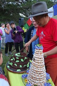 Buddha Weekly Zasep Rinpoche Cuts the Cake at 40th anniversary Dorje Ling Buddhism e1486506598513