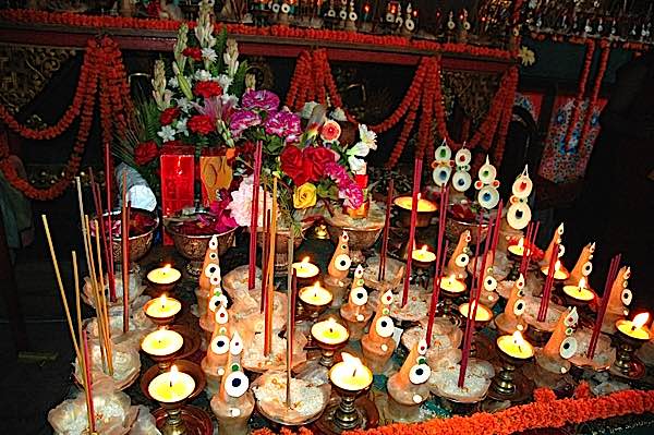 Buddha Weekly Offerings in front of altar Buddhism