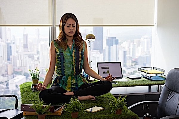 Buddha Weekly Business woman meditating Buddhism