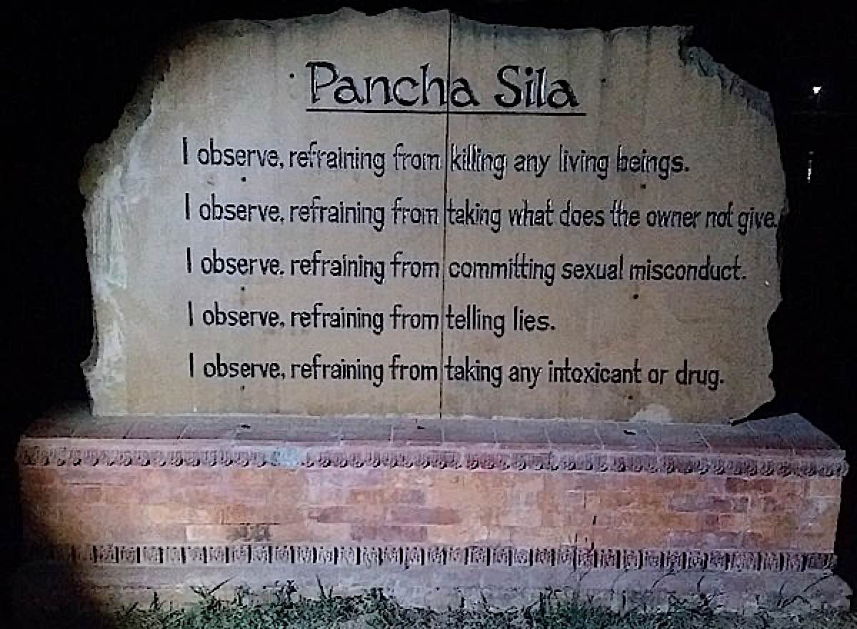 Plaque with the five precepts engraved in Lumbini Park, Nepal.