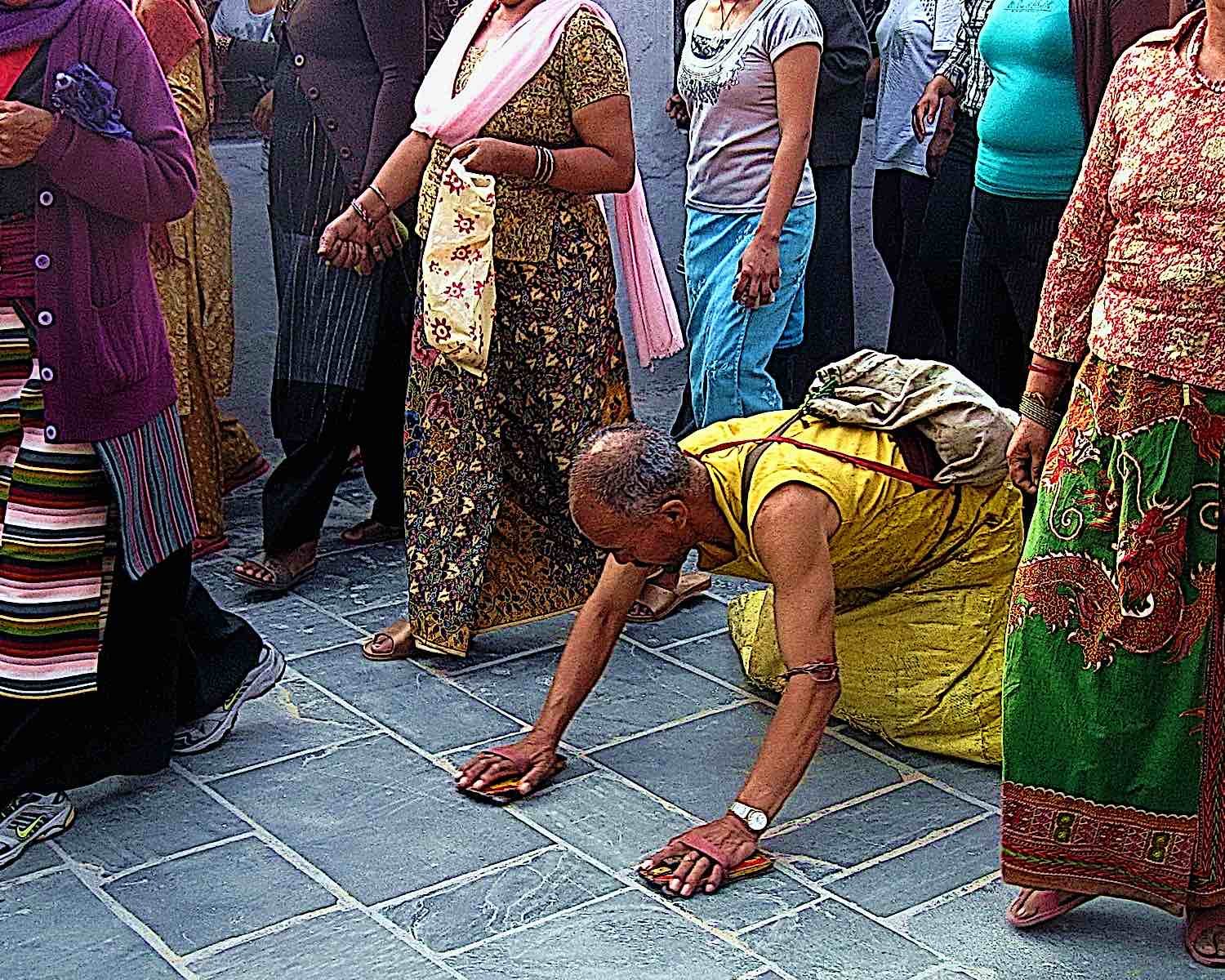 Buddha Weekly Buddhist Prostrations and circumambulation of Stupa in Katmandu Nepal Buddhism