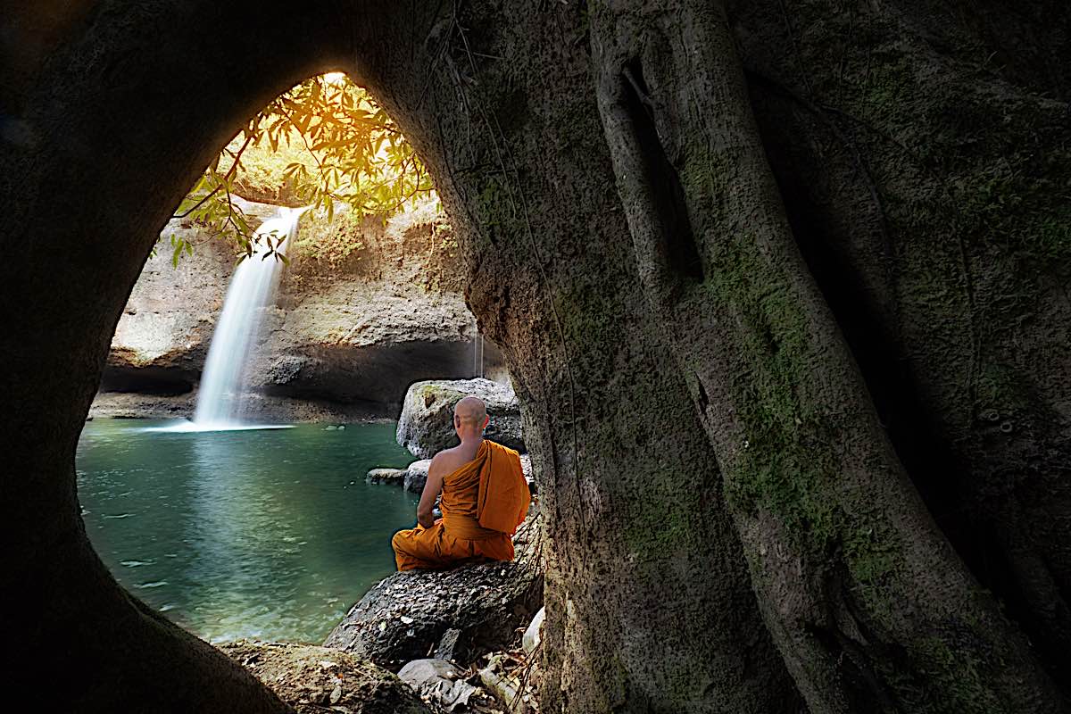 Buddha Weekly Buddhist monk meditating dreamstime xxl 168536176 Buddhism