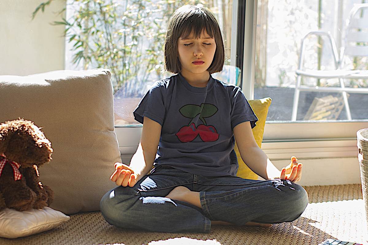 Buddha Weekly Child meditating during lockdown Buddhism