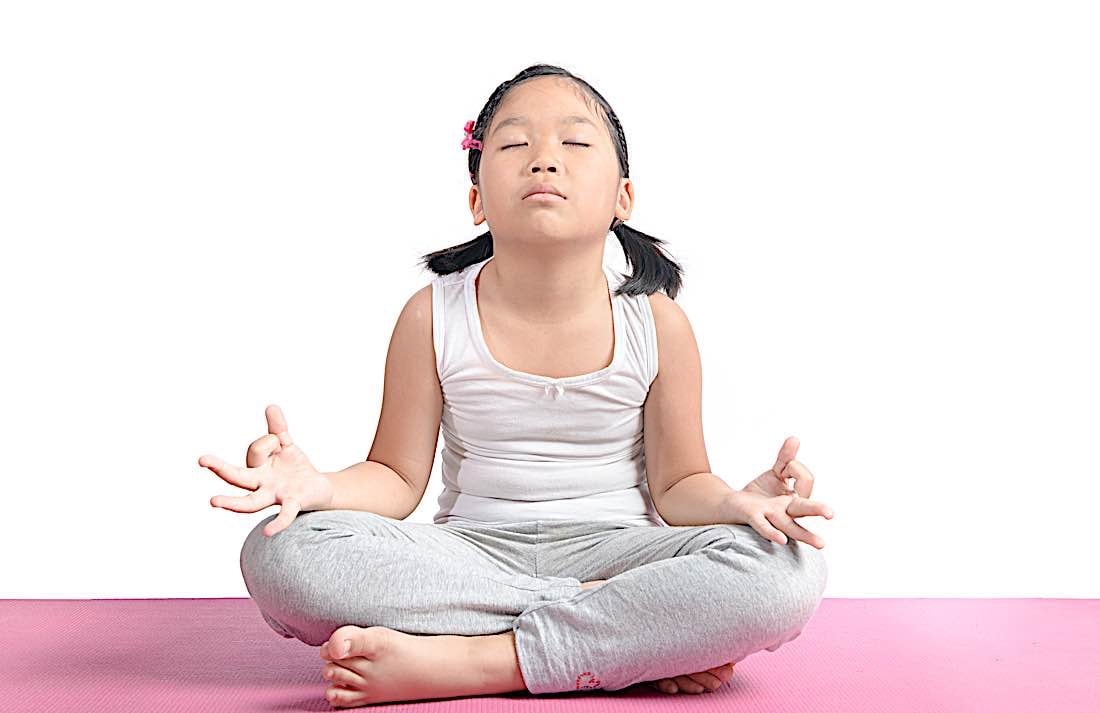 Buddha Weekly Child meditating eyes closed Buddhism