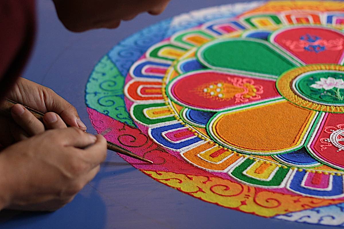 Buddha Weekly Creating a sand mandala is an act of faith concentration meditation patience and energy dreamstime xxl 18837812 Buddhism