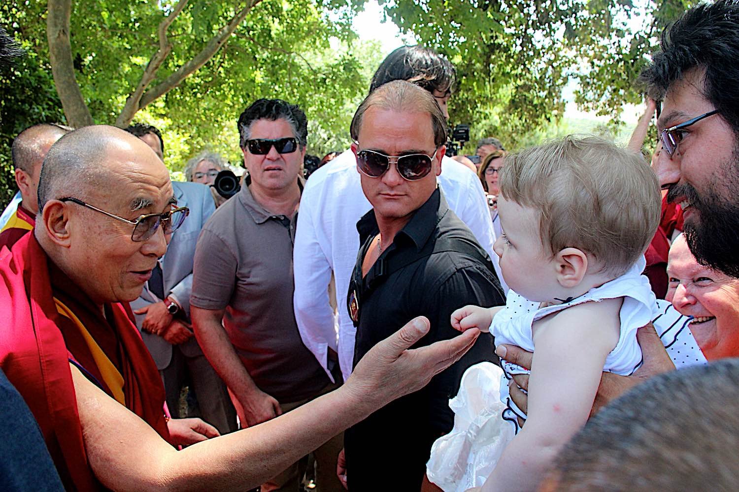 Buddha Weekly Dalai Lama mingling with crowd in Pamaia Piza Italy at Lama Tsongkhapa Institute dreamstime 41532323 Buddhism