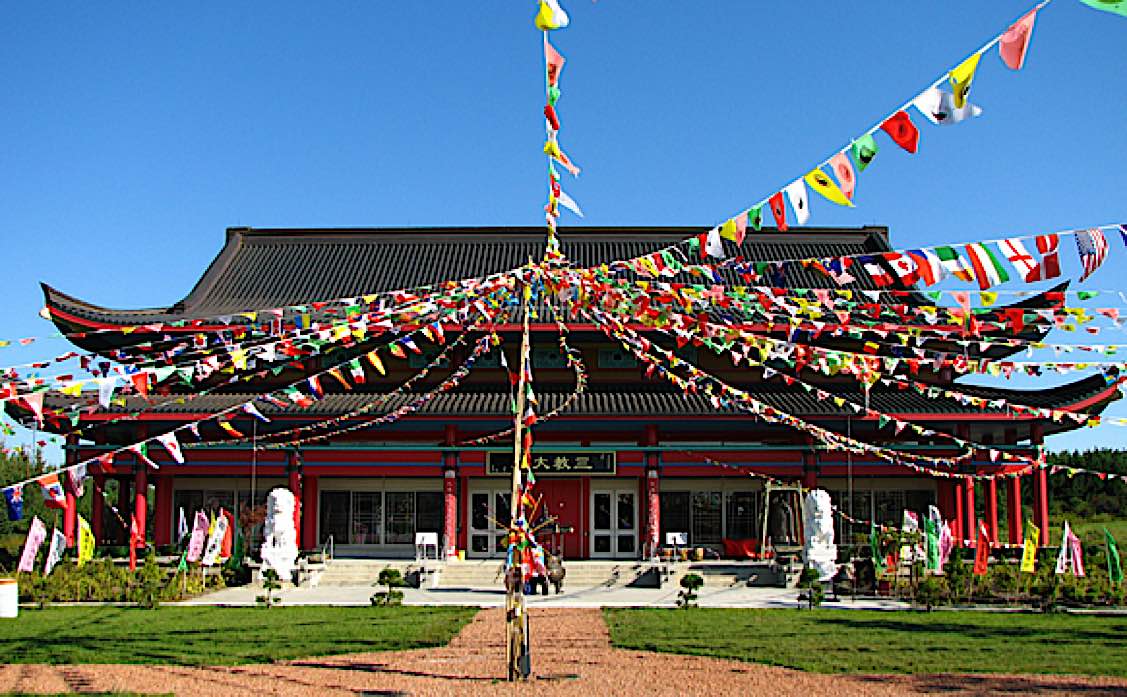 Buddha Weekly Exterior of temple for Fung Loy Kok Taoist Tai Chi International Centre near Orangevill Ontario Buddhism