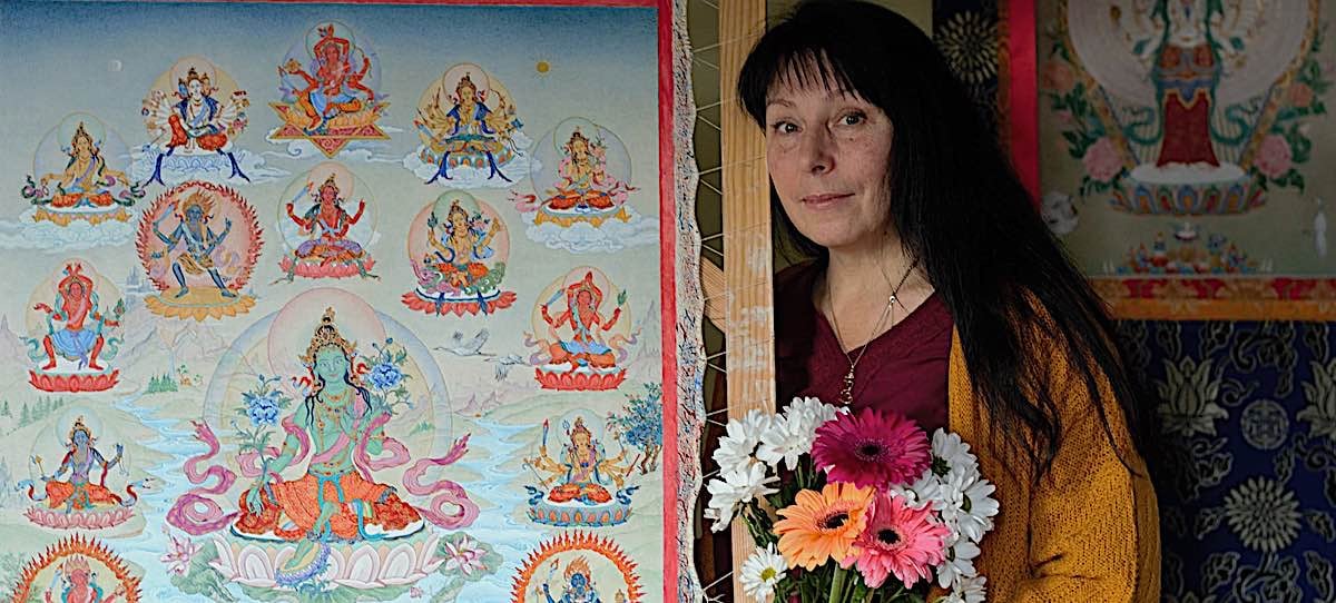 Buddha Weekly Feature image of artist Angeli Lhadripa Shkonda with her 21 Taras thangka Buddhism