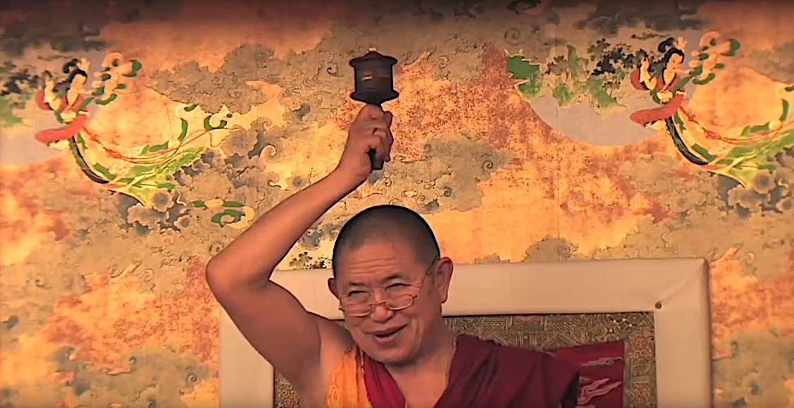 Buddha Weekly Garchen Rinpoche teaching with prayer wheel mani wheel mantra Buddhism