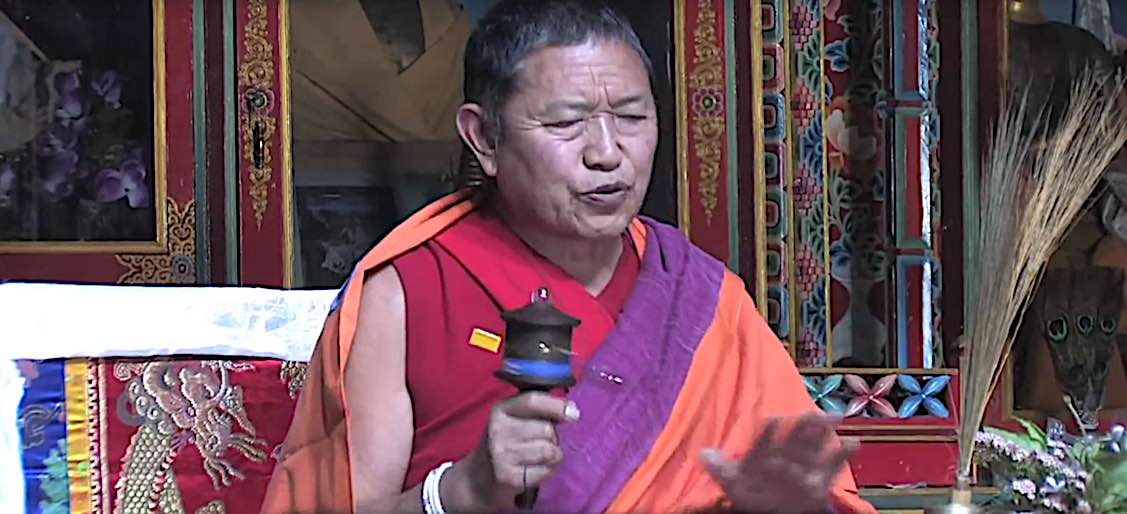 Buddha Weekly Garchen Rinpoche with prayerwheel chanting mantras Buddhism