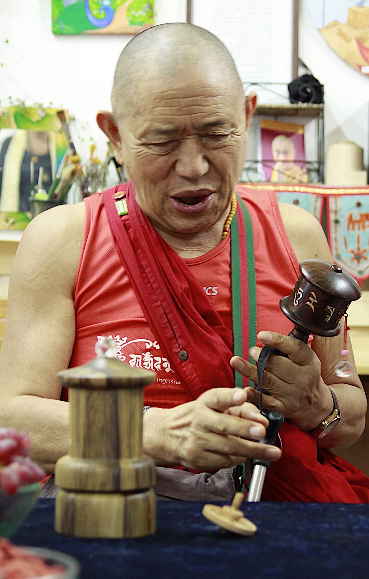 Buddha Weekly H.E. Garchen Rinpoche with with two types of prayer wheel Holy Land Prayer Wheels in Israel Buddhism