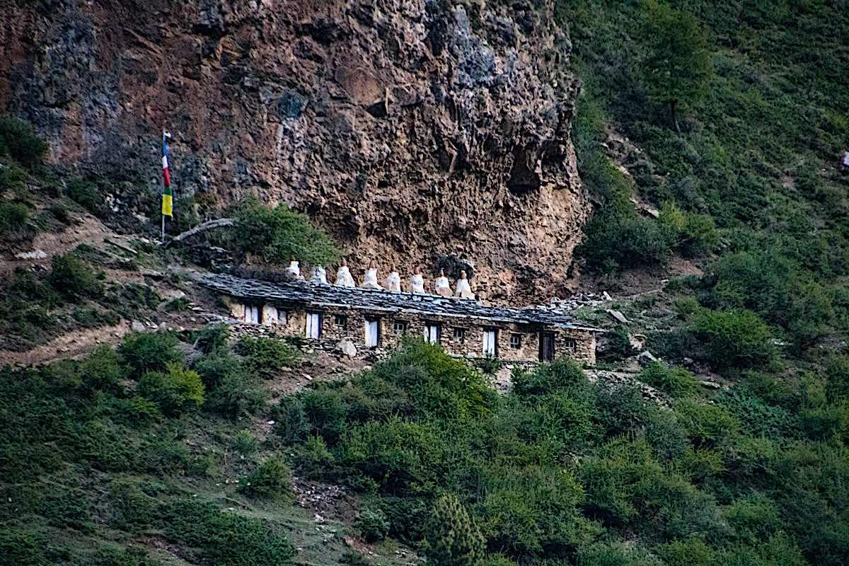 Buddha Weekly Milarepa cave where the great Mahasiddha spent years in solitary meditaiton in Tsum valley near Lamagaun with Milarepa foot in the rock dreamstime l 152383516 Buddhism