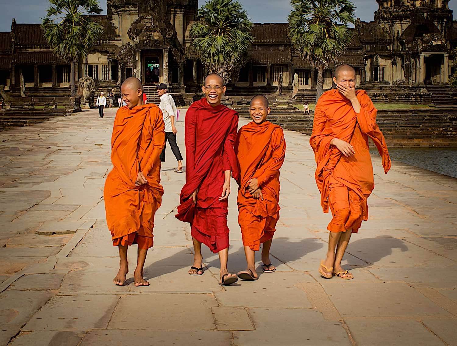 Buddha Weekly Monks laughing at Angkor Wat Cambodia Buddhist students dreamstime l 26047804 Buddhism