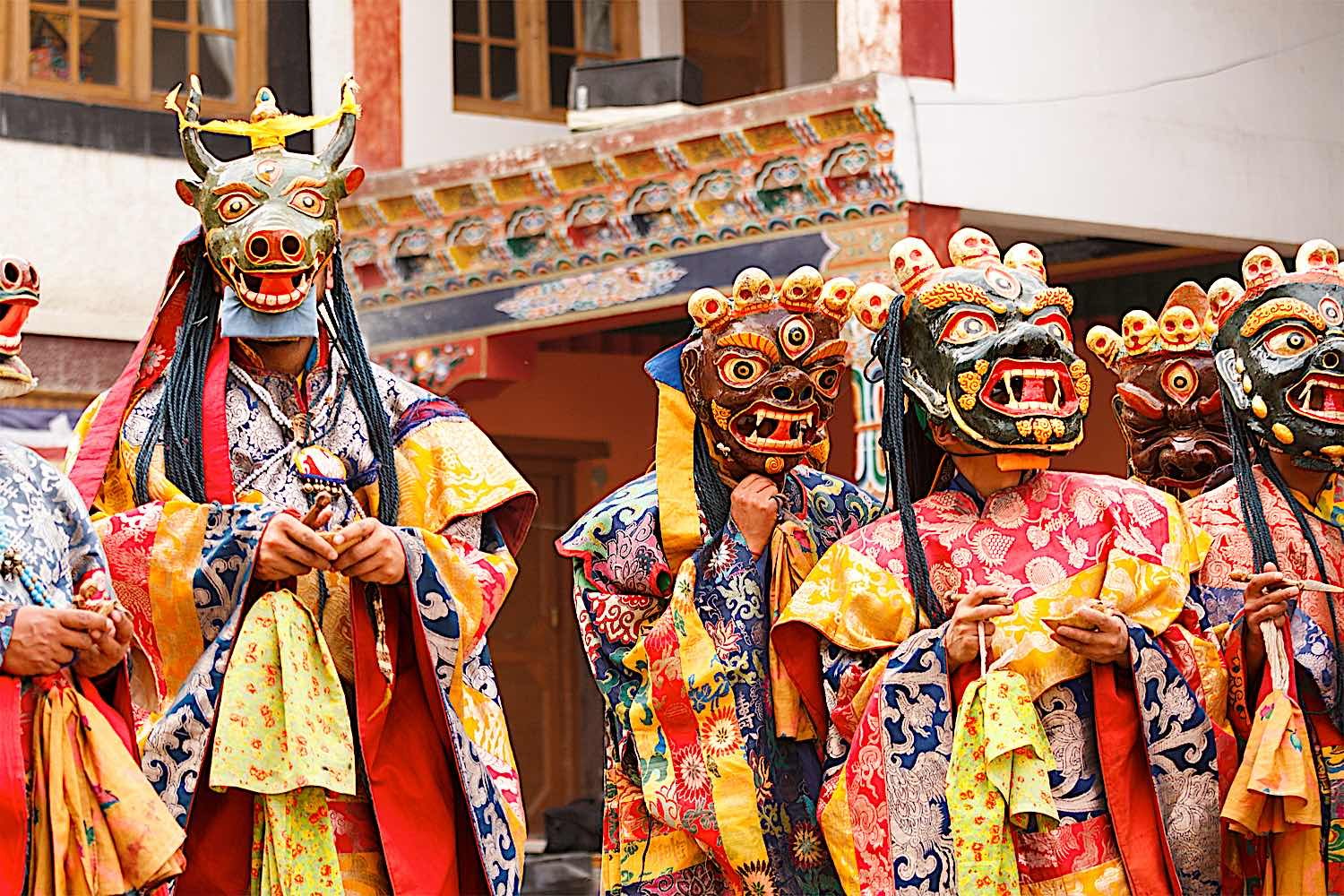 Buddha Weekly Monks perform a masked and costumed mystery dance of Tibetan Buddhism during the Cham Dance Festival in Lamayuru monastery India dreamstime xxl 80261235 Buddhism