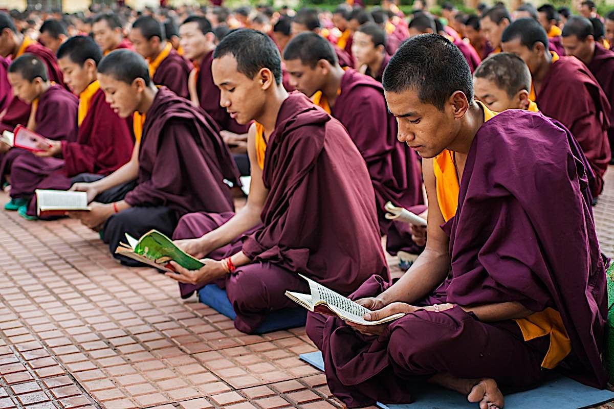 Buddha Weekly Monks reading Sadhana in Kushalnagar India monastery dreamstime l 42435199 Buddhism