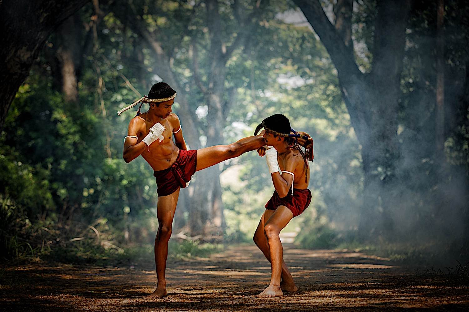 Buddha Weekly Muay Thai or Thai Boxing Thailand two people fighting dreamstime l 96573181 Buddhism