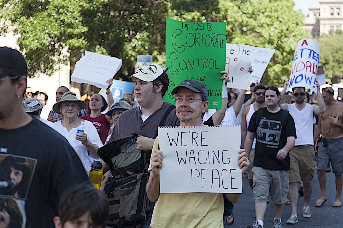 Buddha Weekly Occupy Austin peaceful protest we are waging peace Buddhism