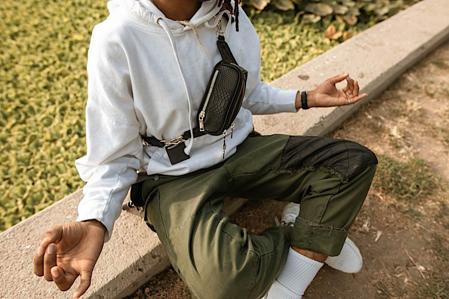 A student meditates briefly on a break. You can meditate anywhere. Studies indicates meditation increases academic performance. 