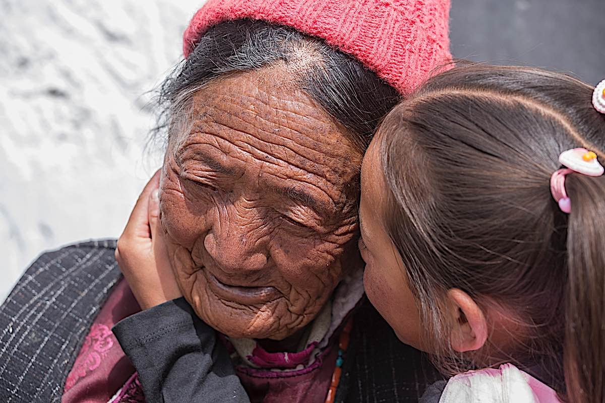 Buddha Weekly Tibetan older woman and child during Hemis Festival in Ladakh North India dreamstime 57350980 Buddhism