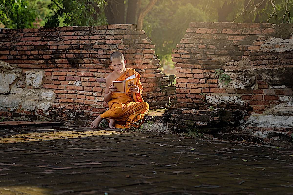 Buddha Weekly Young Buddhist Monk Reading book Buddhism