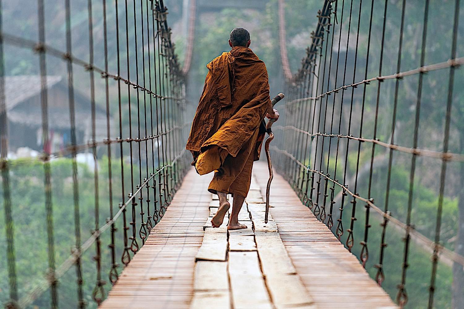 Buddha Weekly monkl walking suspension bridge in Mae Hong Son dreamstime l 168411703 Buddhism