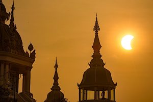 Buddha Weekly partial solar eclipse in Thailand dreamstime l 68297786 Buddhism