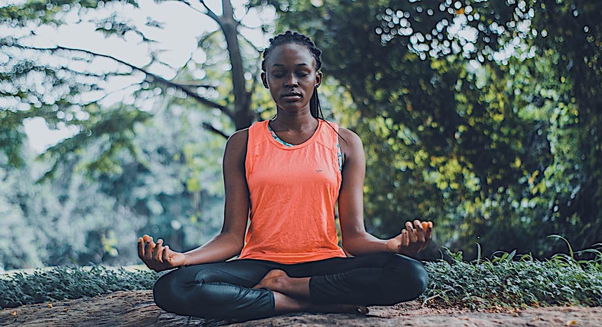 Buddha Weekly woman meditating Buddhism