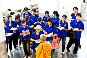 Monk teaching students at Wat Pho Pho Bangkok Thailand dreamstime xl 30782511