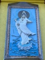 Sculptural relief of Guanyin copyright 2005 Chris Nguyen Tu Quang Temple San Francisco copyright 2023 Anna Hennesse