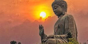 Amoghasiddhi Buddha. The "Tian Tan" or "Giant Buddha" at Po Lin Monastery Ngong Ping in Hong Kong is Amoghasiddhi, held his right hand up in Abhaya Mudra. This huge statue is on top of a mountain, with Amoghasiddhi's gaze looking out on the Samsaric world protectively.