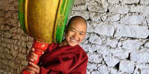 Buddha Weekly Buddhist monk plays drum at Tawang Torgya festival at Arunachel Pradesh India dreamstime l 164775643 Buddhism custom crop