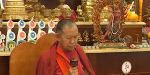 Buddha Weekly H E Garchen Rinpoche teaching Vajrayogini with a Dharma Wheel Buddhism custom crop