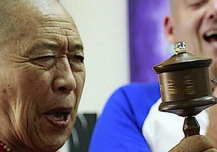 H.E. Garchen RInpoche with Micha Strauss of Galgamani Art Project and a custom made prayer wheel.