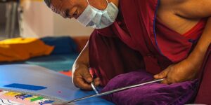 Buddha Weekly Kalachakra sand mandala monks dreamstime 66831866 Buddhism custom crop