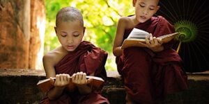 Buddha Weekly Rading sutras is a valuable practice here young monks read sutras aloud dreamstime xxl 33430052 Buddhism custom crop