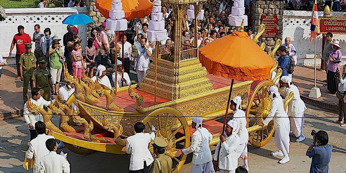 New Year's procession during Phi Mai Lao New Year celebrations in Luang Prabang Laos.