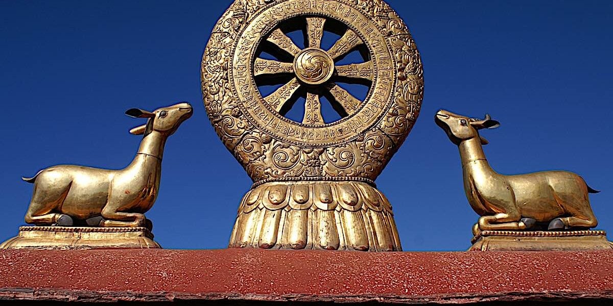 Among the most famous of symbols in Buddhism — the Dharma Wheel. The eight spokes of the wheel represent the eightfold path. The deer are symbolic of Buddha's first teaching in Deer Park.