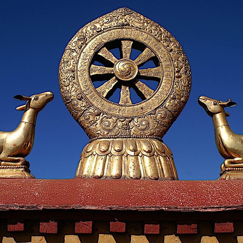 Among the most famous of symbols in Buddhism — the Dharma Wheel. The eight spokes of the wheel represent the eightfold path. The deer are symbolic of Buddha's first teaching in Deer Park.