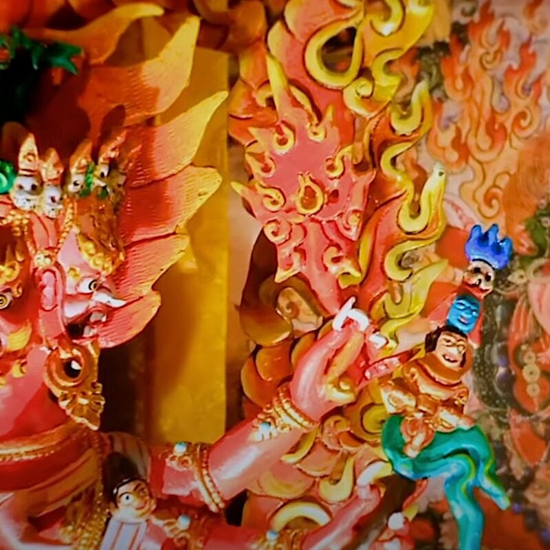 Hayagriva devotional statue in front of a Hayagriva Sangdrup thangka. Statue painted as a devotional practice by Kam Wai Yu, of Buddha Weekly.