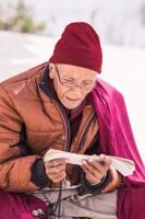 chanting daily at Bouddanath temple Katmandu dreamstime xl 69212523