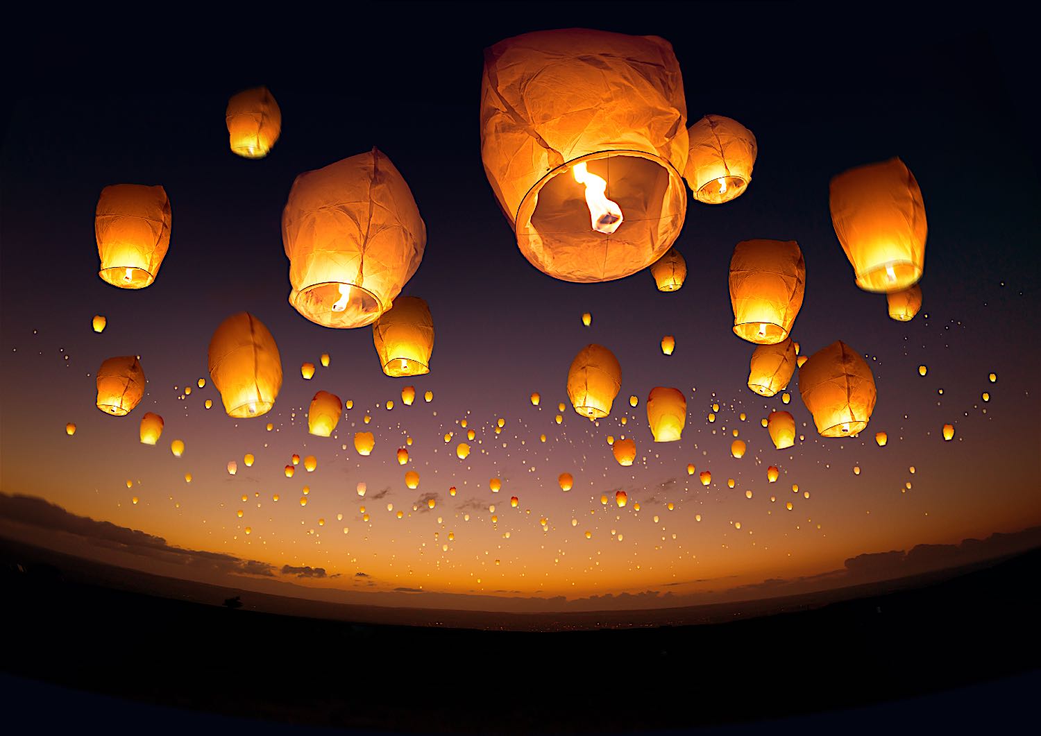 Lanterns carry the "wishes" of celebrators to the heavens. Nothing is more beautiful than the floating lanterns lifting into the night sky. 